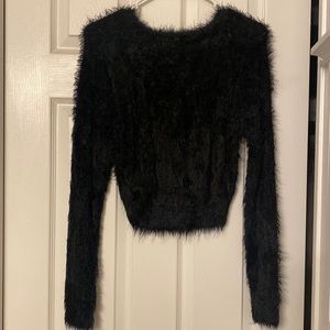Ultra-soft, black, cropped sweater size medium.